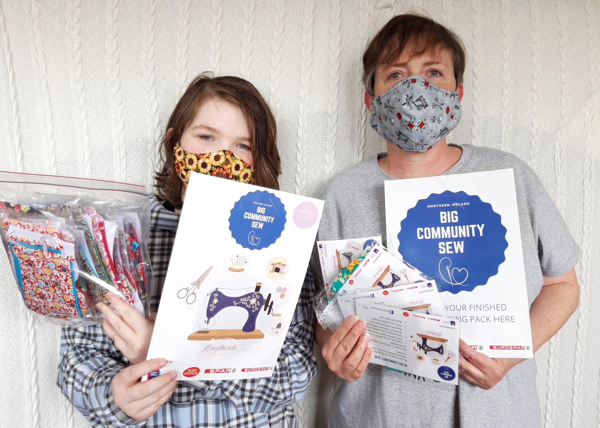 Group making face masks for vulnerable