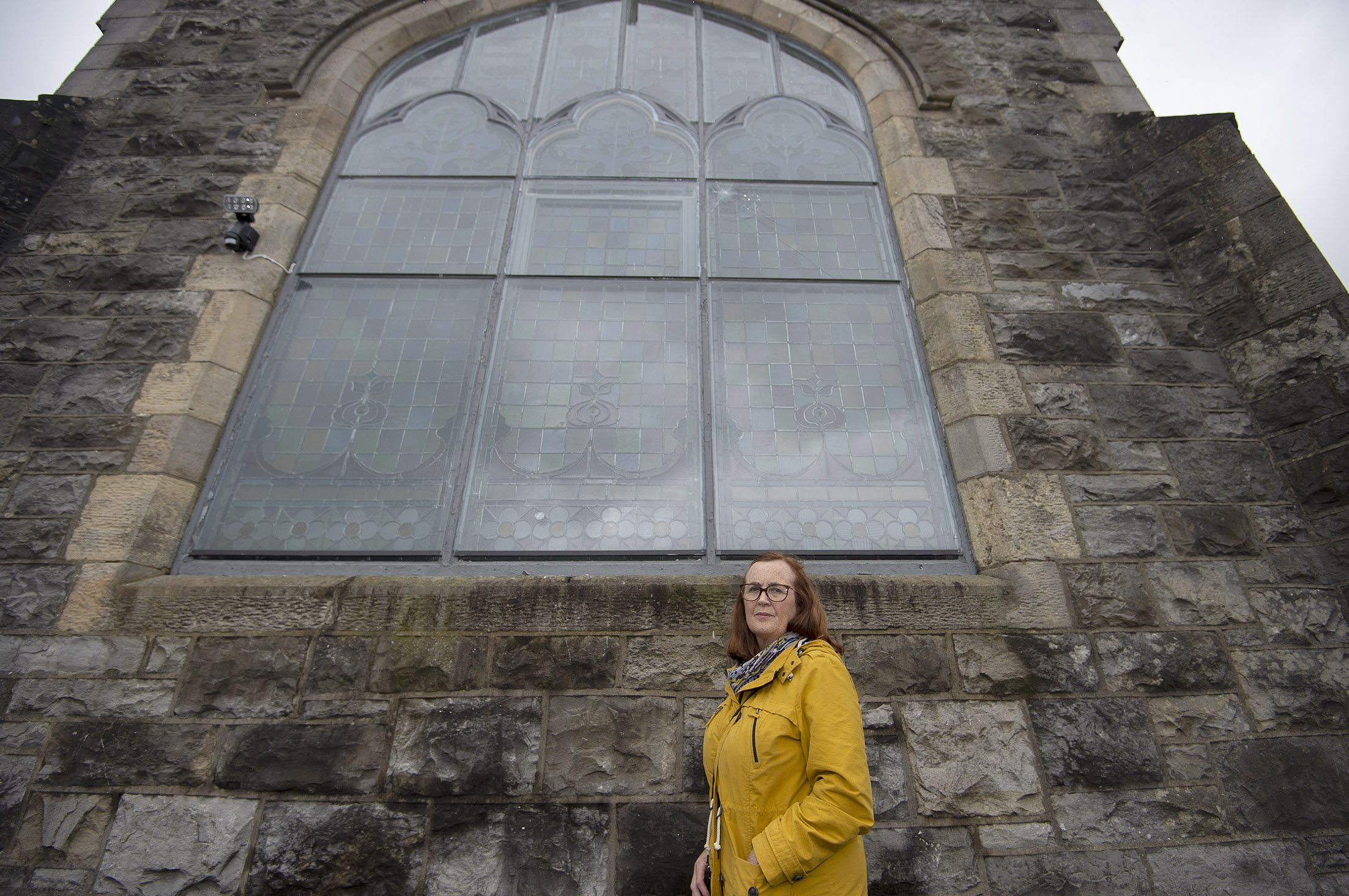Stained glass window being used as ‘target practice’