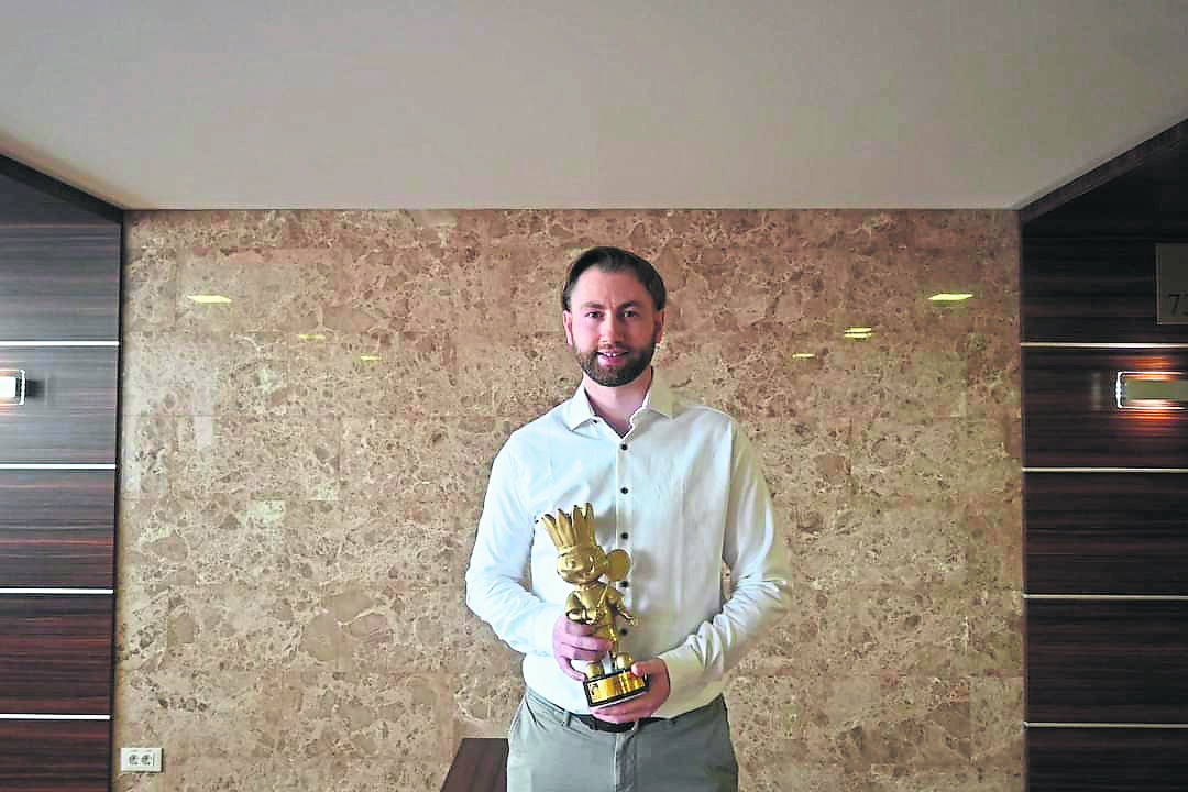 Magee named Coach of the Year