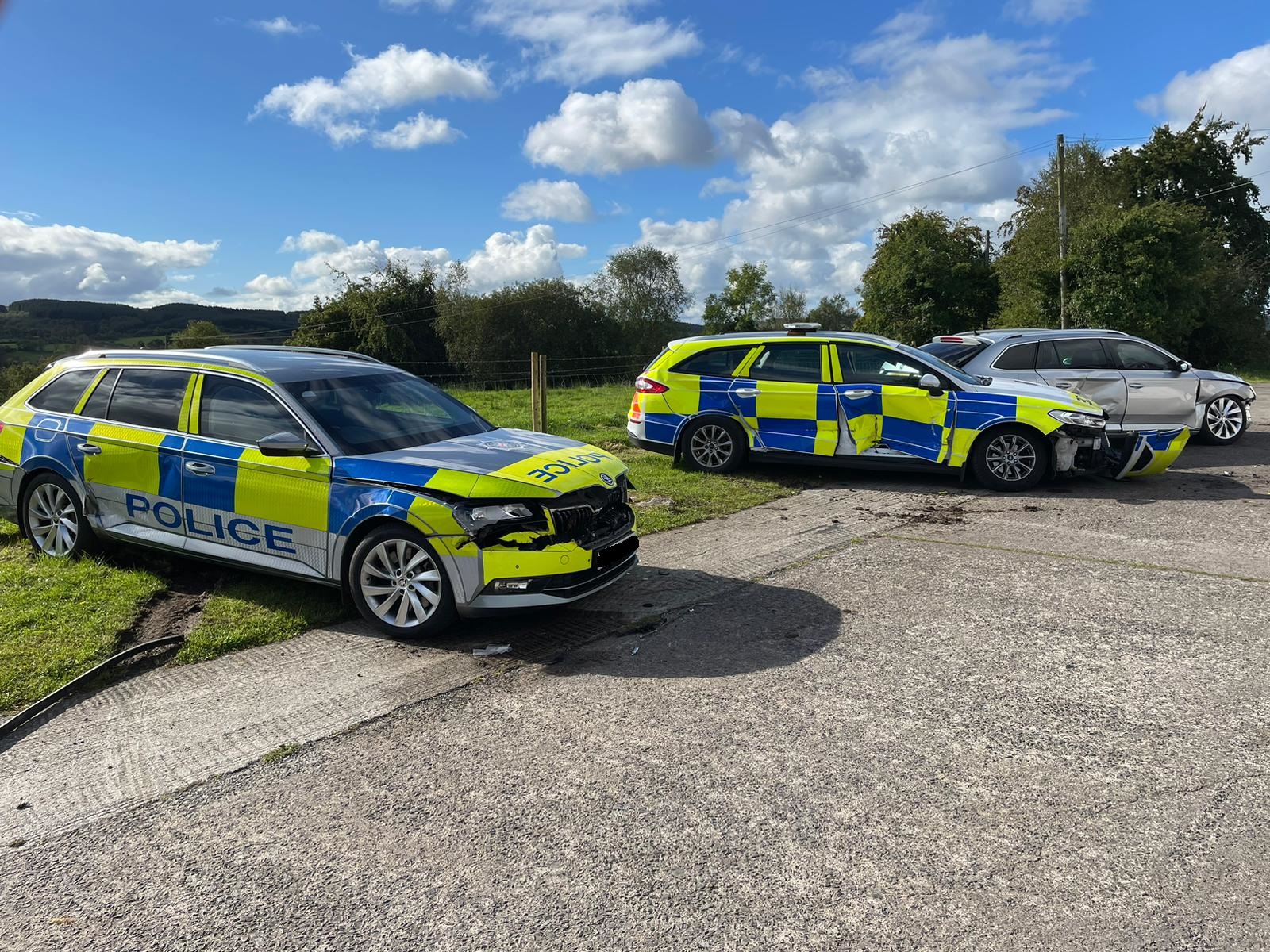 Man arrested after ramming police vehicles with tractor
