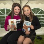 Cousins Emily and Charley Finlay buy some books for their summer reads. JasMc12