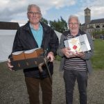 Friends James Hamilton and Colin Campbell happy with their day; a bellyful of strawberries and some second hand market bargains. JasMc11