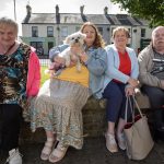 Friends relax in the sun at the Sion Strawberry fair. JasMc14