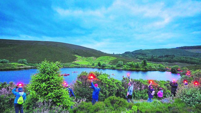 ‘Lumenators’ carry low-impact geolights around the shorelines of the Gortin Lakes, in celebration of the wondrous natural beauty that exists in tranquil Tyrone.