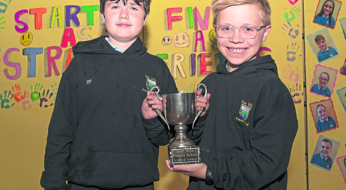 Rhys and Noah receive the Science Cup. JasMc8