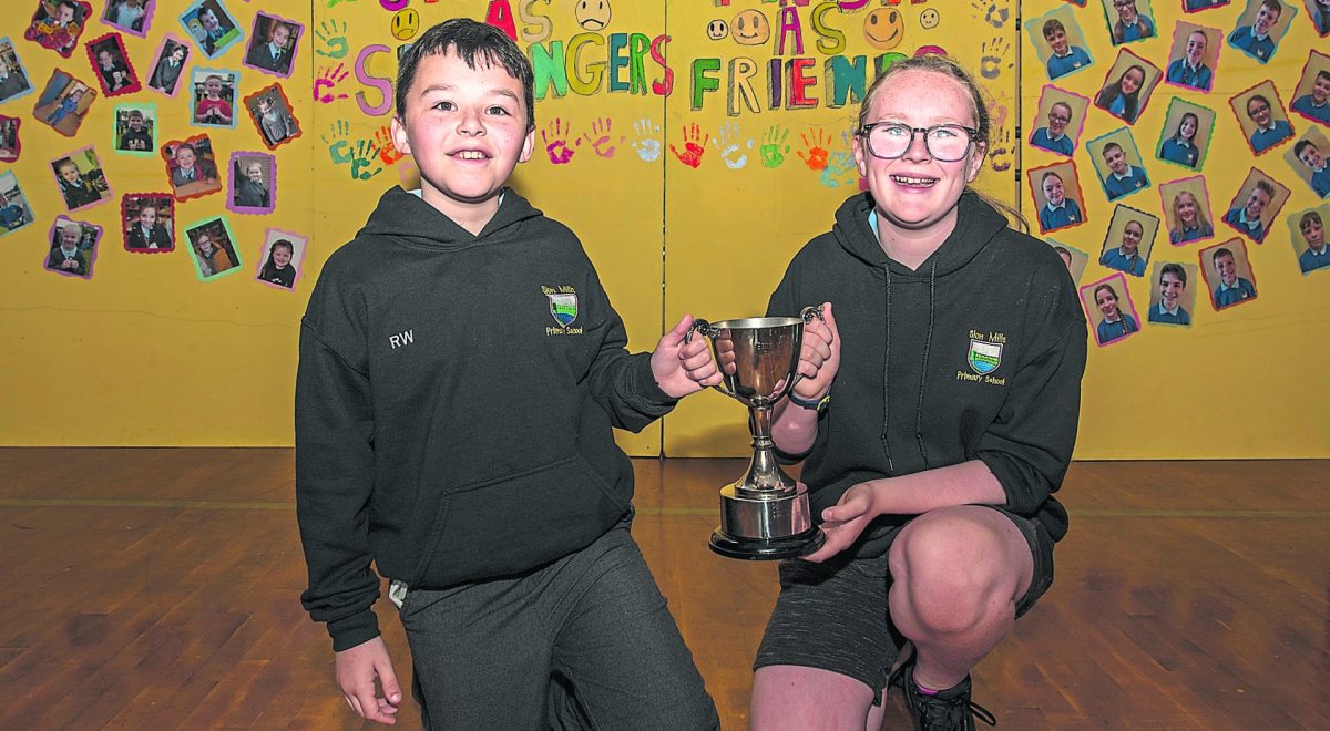 Robert and Emily receive the Deidre Armor Cup (WAU/ECO/Rights Respecting Schools). JasMc5