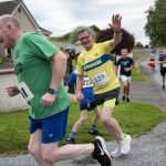 Popular local runner Philip McNamee gives our photographer a wave. JasMc10