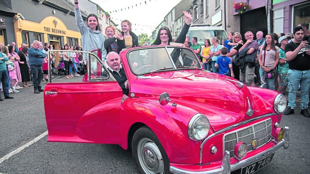 Sean Duncan brought his grandchildren on the vintage parade aboard his 1950 Morris Minor. JasMc18