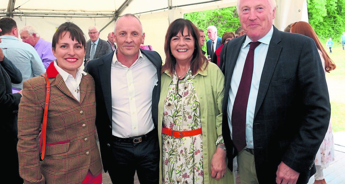 Amy and Paul Kinane, judging at the clogher Valley Show, with Maureen Roberts, and Edwin Boyd, steward. MC 76