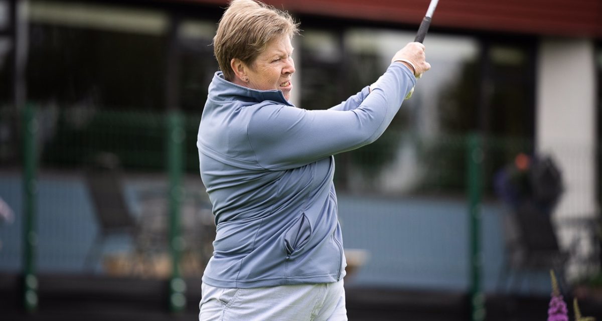 Helen McGaughey sends her ball down the fairway with a good, clean drive. KMG06