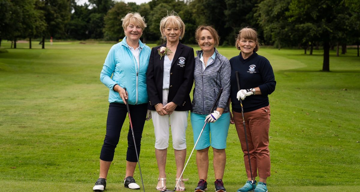 Monica McGettigan, Heather Mitchell, Lady Vice President, and Maeve Corry, Lady President, join Geraldine McCrory on her special day at Strabane Golf Club. KMG07