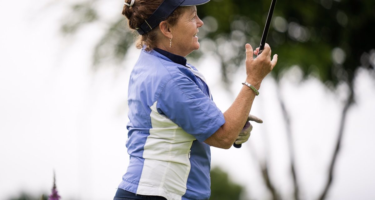 Amelda Doherty is pleased to get her day's golfing off to a fine start after an excellent drive. KMG11