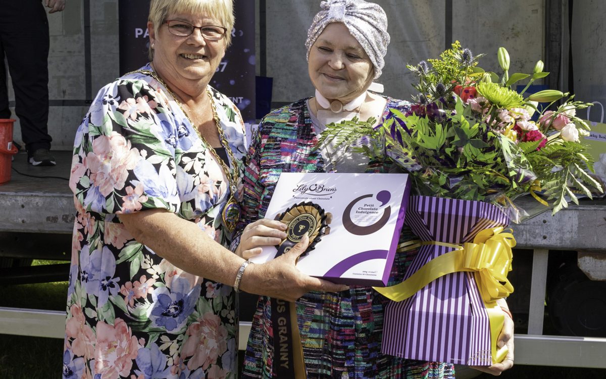 Deputy mayor Angela Dobbins presents Jean Mullen with the prze for winner of the glamourus gran.