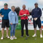 Marie Meenagh representing Mountfield Community Association, welcomes Paul McSorley, Mark Taggart and Shane McFadden to their Golf Classic at Omagh Golf Club.JMG1