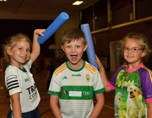 Friends Neassa and Elana have a little fun at the fitness camp held in St Davog’s GAA, Aghyaran as they pretend to beat Paudie over the held with foam rollers. DR24