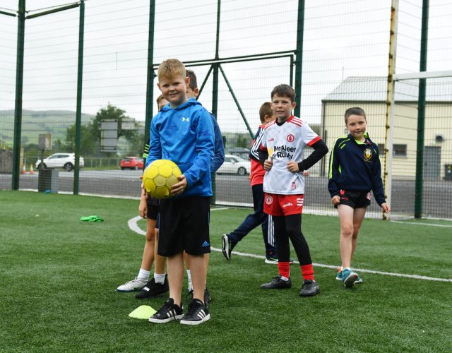 The boys get ready to take on the girls at kick rounders. DR31