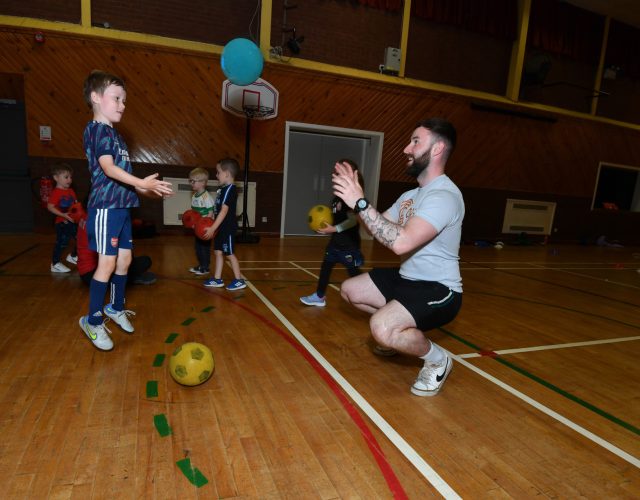 David Doherty from Core Fitness playing some ball with Eolann during the sessions. DR28