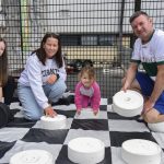 The McCaskie family enjoy their game of giant draughts. JasMc5