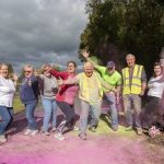 Organisers have fun celebrating a successful Color Run. JasMc