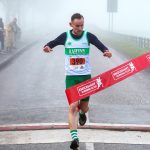 Kieran Kelly Ratheny Shamrocks crosses the finish line to win the 2022 Male Rudolph Run 5k race in a time of 14:47.JMG7