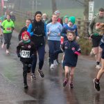 Cara McElroy leads the pack during the 2022 Rudolph Run 5k race.JMG4