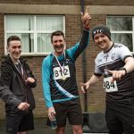 Carmen Runners Nick Campbell, Julian McKeown and Gavin Rushe pull some moves after they cross the finish line. JasMc10