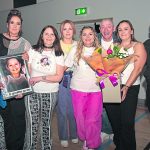 Paula's family presented with flowers and a framed momento. JasMc9