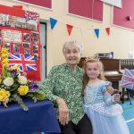 Epsie Allison Year 1 Pupils at Gortin Primary School with Mrs Joan Hempton during the celebratory tea party to mark the Coronation of His Majesty King Charles III.JMG14